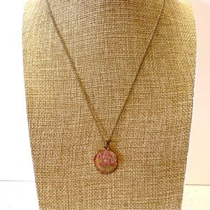 Lilly Pulitzer necklace, gold tone chain w/ pendant in a colorful tropical print
